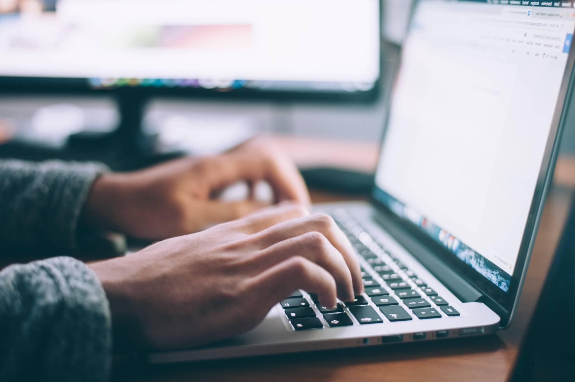 A person working on their laptop